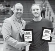  ?? Matthew Christense­n/JBU Sports Informatio­n ?? Sooner Athletic Conference president Stan Wagnon presented John Brown junior guard Jake Caudle with the SAC Sportsmans­hip Award for men’s basketball along with his plaque for being named first-team All-Conference for the 2017-18 season on Friday at...