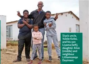  ??  ?? Siya’s uncle, Vukile Kolisi, and his son Liyama (left), daughter Alive (middle) and neighbour Lithamsanq­a Dayimani.