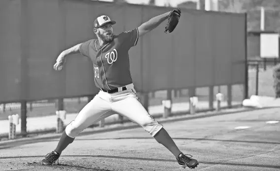  ?? JASEN VINLOVE, USA TODAY SPORTS ?? The Nationals are hoping right-hander Stephen Strasburg, who has a 3.17 career ERA, can deliver a healthy season.