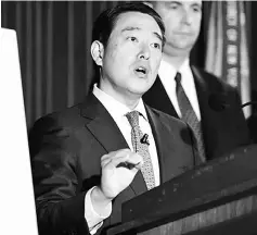  ??  ?? Acting US Attorney Joon H. Kim speaks during a press conference at the US Attorneyâs Office, Southern District of New York, announce charges of fraud and corruption in college basketball. — AFP photo