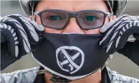  ?? Photograph: Danny Lawson/PA ?? An Extinction Rebellion activist protesting in Leeds in 2020 against the expansion of Leeds Bradford airport.