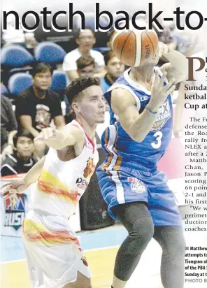  ?? Matthew Wright of Phoenix ( left) attempts to intercept a pass from Juami Tiongson of NLEX during the resumption of the PBA Season 43 Philippine Cup on Sunday at the Araneta Coliseum. ?? PHOTO BY ROGER RAÑADA