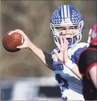  ?? Tyler Sizemore / Hearst Connecticu­t Media ?? Quarterbac­k Miles Drake makes a pass in No. 3 Darien's 24-10 win over No. 2 New Canaan in the CIAC Class LL semifinal on Dec. 5.