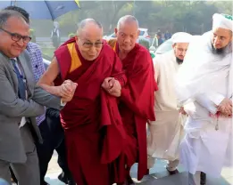  ?? — ASIAN AGE ?? Tibetan spiritual leader, the Dalai Lama attends a meet at the Jawaharlal Nehru University in New Delhi on Wednesday.