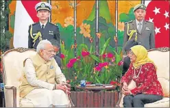  ?? PTI FILE ?? PM Narendra Modi with Singapore President Halimah Yacob.