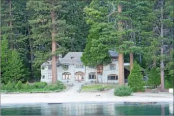  ?? PHOTO COURTESY OF LAKE TAHOE TOURIM ?? At one end of the bay is Vikingshol­m, the giant Scandinavi­an-style house built in 1928 owned by Lora Josephine Knight.