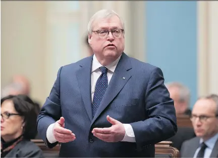  ?? JACQUES BOISSINOT/THE CANADIAN PRESS ?? Health Minister Gaétan Barrette cut medical school admissions last year, saying too many are graduating.