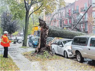  ?? RYAN REMIORZ THE CANADIAN PRESS ?? Some Hydro-Québec customers were without power after rain and strong winds hit the province.