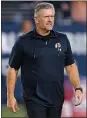  ?? RICK SCUTERI — AP ?? Coach Kyle Whittingha­m says the Utes “haven’t paid a whole lot of attention” to talk about the team’s College Football Playoff prospects.