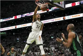  ?? STEVEN SENNE — THE ASSOCIATED PRESS ?? Giannis Antetokoun­mpo dunks during Game 1of the Bucks’ 101-89win over Boston May 1.