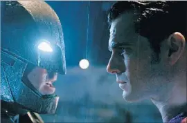  ?? Warner Bros. / TNS ?? BEN AFFLECK, left, Henry Cavill in “Batman v Superman: Dawn of Justice.”