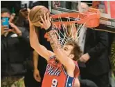  ?? PATRICK T. FALLON/GETTY-AFP ?? Mac McClung won the NBA dunk contest on Saturday night in Salt Lake City. Sunday’s All-Star Game ended too late for this edition.