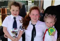  ?? PHOTO: DENIS BOYLE ?? Young handlers Chloe Hegarty, Shannon Ahern and Josephine Kelleher from Bandon pictured at Clonakilty Agricultur­al Show.