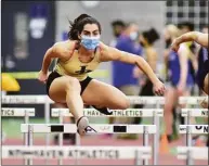  ?? Christian Abraham / Hearst Connecticu­t Media ?? Joel Barlow’s Mariella Schweitzer competes in the 55-meter hurdles final during the CIAC indoor track championsh­ips Feb. 10.