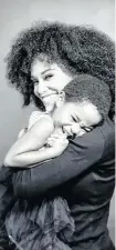  ??  ?? THUSI shared this image of her and a little girl to her Instagram recently. The child also features in her mother’s day shoot.