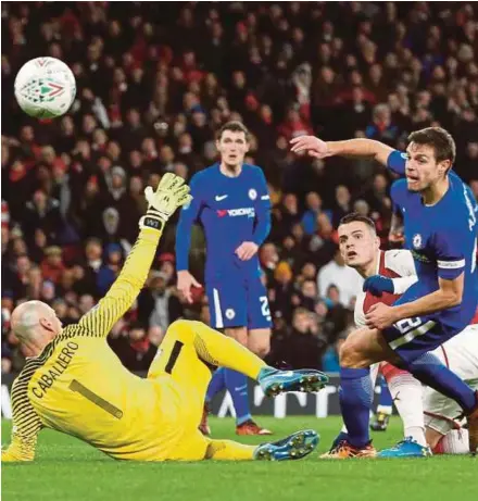  ?? REUTERS PIC ?? Arsenal’s Granit Xhaka (third from left) scores their second goal in a League Cup semi-final secondroun­d match at the Emirates Stadium on Wednesday.