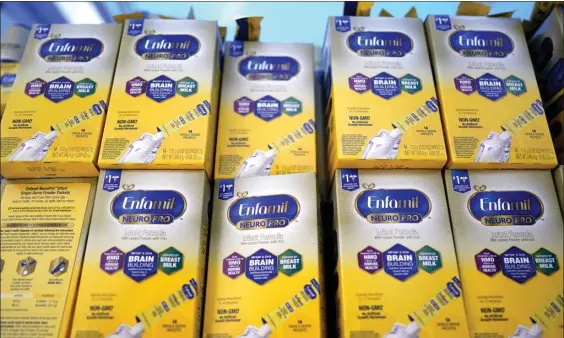  ?? AP FILE ?? BACK ON SHELVES SOON? Infant formula is stacked on a table during a baby formula drive to help with the shortage last weekend in Houston.