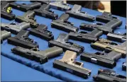  ?? DAKOTA SANTIAGO — THE NEW YORK TIMES ?? So-called “ghost guns” are displayed during an NYPD news conference in New York, in May of 2022.