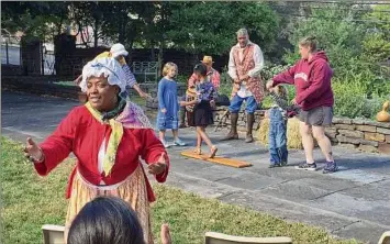  ?? Photo courtesy of Heidi Hill ?? A demonstrat­ion of African enslaved culture held at Schuyler Mansion in Albany in September 2016. The lives of enslaved people will be part of this summer’s immersion tours.