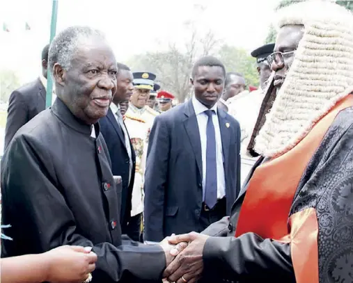  ??  ?? President Sata being welcomed by Speaker of the National Assembly Dr Patrick Matibini during the opening of Parliament