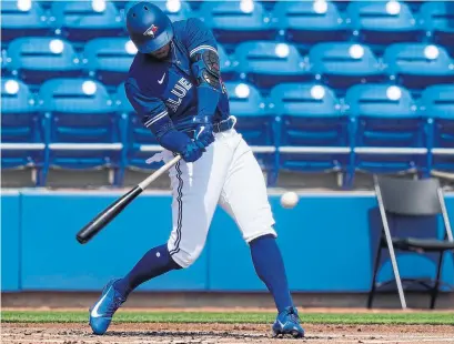  ?? FRANK FRANKLIN II THE ASSOCIATED PRESS ?? Blue Jays outfielder George Springer hits a leadoff single in the first inning Tuesday against Philadelph­ia. The last time Springer hit somewhere in the order other than in the leadoff spot was almost five years ago.