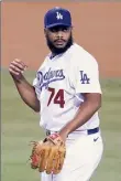  ?? John Mccoy / Getty ?? L.A.’S Kenley Jansen couldn’t finish Game 2 against San Diego, coming up one out short.