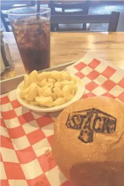  ?? PHOTO BY SUSAN PIERCE ?? Stack makes its own hamburger buns and brands them with the restaurant’s logo.