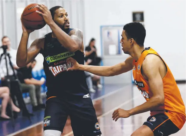  ?? Picture: STEWART MCLEAN ?? TEAM FIRST: New Taipans DJ Newbill and Dexter Kernich-Drew train ahead of their season opener against the Brisbane Bullets.