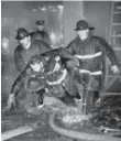  ??  ?? This image of a firefighte­r being rescued won Innell best picture of the year honours in 1969 from the Toronto firefighte­rs associatio­n.