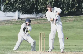  ??  ?? Easington batsman Mark Cowell is closely watched by Bill Quay wicket keeper James Hodgson.