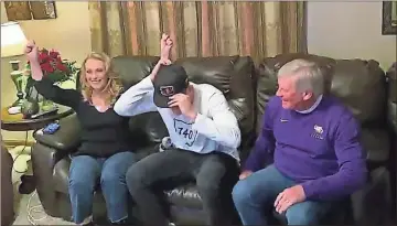  ?? NFL via AP ?? In a still image from video, former LSU quarterbac­k Joe Burrow is joined by his parents at the family home after being taken with the No. 1 pick by the Bengals on Thursday.