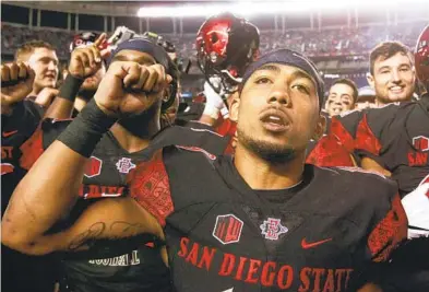  ?? HAYNE PALMOUR IV FOR THE U-T ?? Ex-Aztecs running back D.J. Pumphrey, seen here in 2016, earned his degree after an NFL stint with Philadelph­ia.