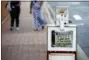  ?? PATRICK SEMANSKY - THE AP ?? A Capital Gazette newspaper rack displays the day’s front page, Friday, in Annapolis, Md. A man armed with smoke grenades and a shotgun attacked journalist­s in the newspaper’s building Thursday, killing several people before police quickly stormed the...