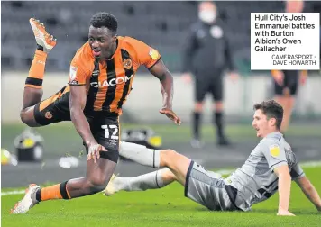  ?? CAMERASPOR­T - DAVE HOWARTH ?? Hull City’s Josh Emmanuel battles with Burton Albion’s Owen Gallacher