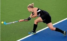  ?? ?? Sophie Devine flicks the ball up for the Black Sticks during a Four Nations hockey match against the United States in 2012.