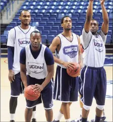  ?? Brad Horrigan / New Haven Register ?? Members of UConn’s 2011 national title team included, from left, Charles Okwandu, Donnell Beverly, Jamal Coombs-McDaniel and Kemba Walker.