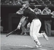  ?? Eric Christian Smith / Contributo­r ?? First baseman Joe Davis has hit for power (51 homers) and average (.316) during his four years at UH.