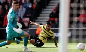  ?? Photograph: Kieran Cleeves/PA ?? Watford’s Cucho Hernández hits the deck as he sees the ball on its way into the net for his first goal.