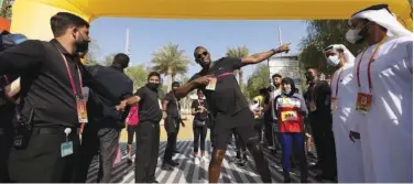  ?? ?? ↑
The fastest man in the world, the Jamaican Usain Bolt, participat­ed in a family race for 1.45 kilometres at the Expo Dubai 2020 on Saturday.