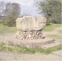  ??  ?? The glacial boulder which now stands on the concrete plinth