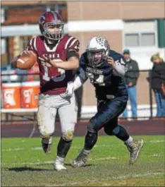  ?? PETE BANNAN — DIGITAL FIRST MEDIA ?? Chichester quarterbac­k Andrew Rodriguez tries to avoid the pressure of Sun Valley lineman Dathan Poole Thursday. Rodriguez threw for 296 yards to get the Eagles back in the game, but Sun Valley held on for a 32-30 win in the 50th edition of the teams’...