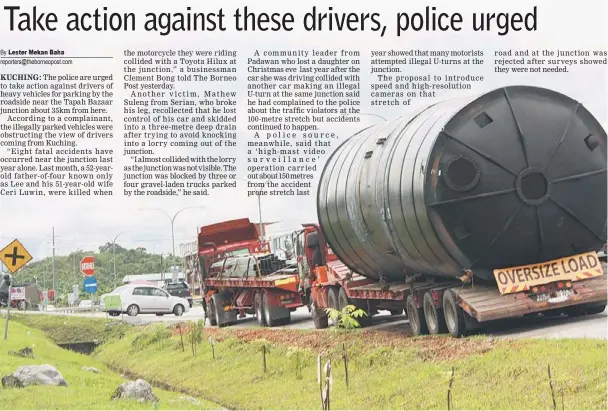  ??  ?? ENDANGERIN­G LIVES: Long trailers parked by the roadside blocking the views of other drivers coming down from Kuching.