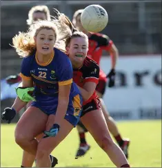  ??  ?? Wicklow’s Sarah Miley is challenged by Cliodhna Doherty of Down.