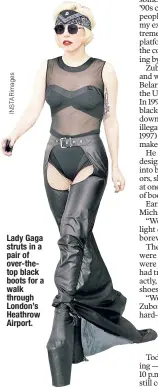  ??  ?? Lady Gaga struts in a pair of over-thetop black boots for a walk through London’s Heathrow Airport.