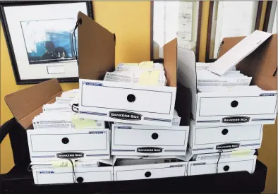  ?? Hearst Connecticu­t Media file photo ?? Stack of trays of absentee ballots await counting in advance of Election Day on Tuesday.