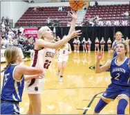  ?? Mark Ross/Special to the Herald-Leader ?? Siloam Springs senior Sophie Stephenson (middle) goes up for a shot as Harrison’s Claire Cecil (left) and Brooklyn Mitchell (right) defend during the Lady Panthers’ 59-42 victory on Friday, Jan. 27, at Panther Activity Center.
