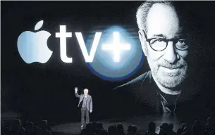  ?? NOAH BERGER AFP/GETTY IMAGES FILE PHOTO ?? Netflix’s rivals, such as Apple, have strong brand names and big chequebook­s, and are able to get big industry titans like Steven Spielberg on board.