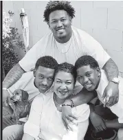  ?? Courtesy of the Jordan Family ?? Brevin Jordan, left, with his mother, Beverly, younger brother Jalen, and oldest brother O’Shay, top, is back in Las Vegas, where the Strip is dark because everything’s shut down.