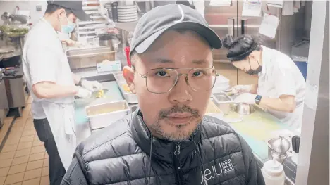 ?? AP BEBETO MATTHEWS/ ?? Korean American chef Douglas Kim is certain virus-fueled racism was behind the vandalism at his restaurant in New York City.