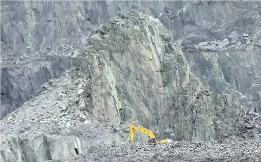  ??  ?? The quarry at Llanberis where Y Ceiliog Mawr – or the Big Cockerel – is located